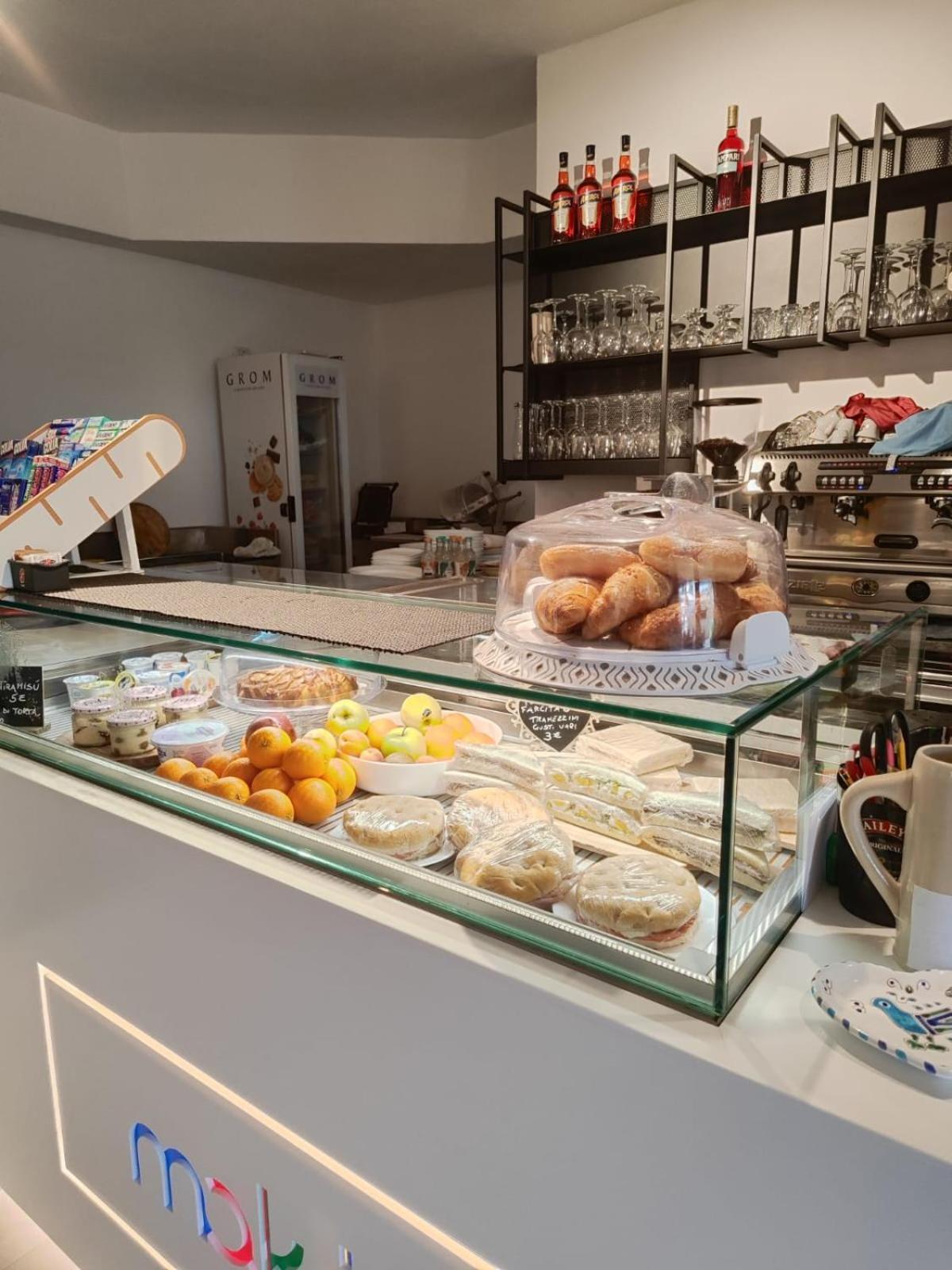 Maksim Food Drink Rooms Golfo Aranci Bagian luar foto